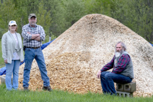 Donna Pion, Roger Pion, and Luke Persons, owners of Green State Biochar, are producing biochar from wood waste purchased at local sawmills. Photo by Erica Houskeeper.