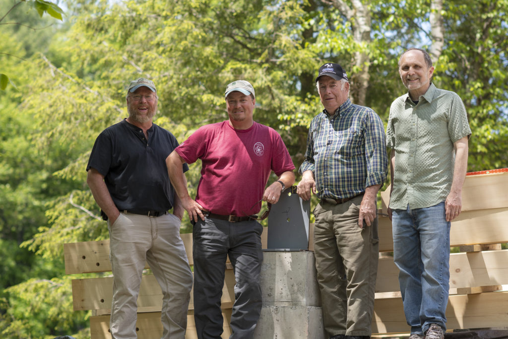 In Vermont, because it is a small state, people in the forest products industry forge lasting relationships. From left, Andy Harper, Dave Wilcox, George Wilcox, and Randy Kay. 