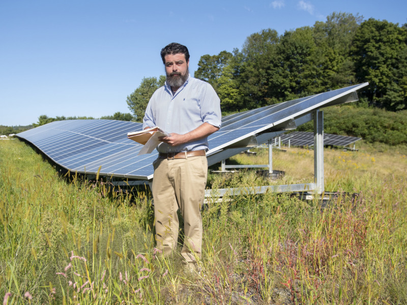 Morgan Casella of Dynamic Organics with Solar Panels
