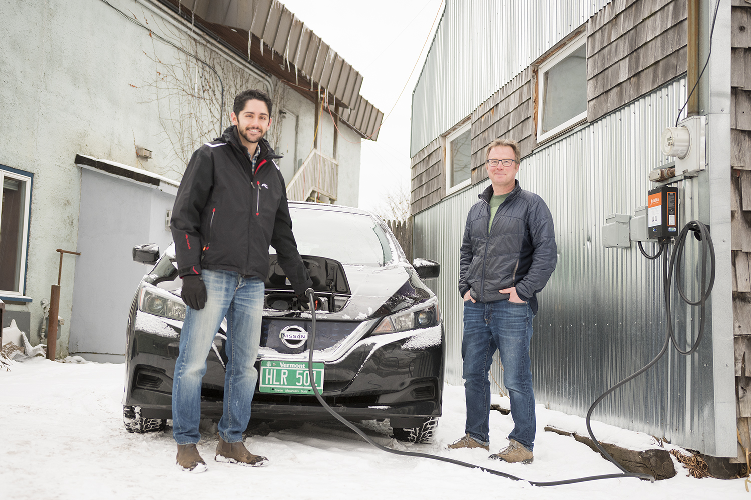 GMP Innovation Strategist Graham Turk Plugs into an EVmatch charging station with DeltaClimeVT Mentor AJ Rossman