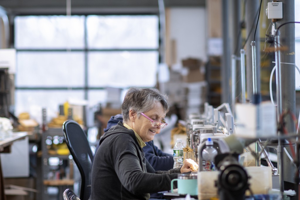 Vemont Glove Employee Sewing Gloves