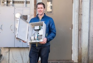 Infisense cofounder Tim Guiterman visits 12-22 North in Burlington. The building, owned by AJ Rossman, is equipped with Infisense sensors to collect data on temperature, humidity, and occupancy, and send alerts when a room is empty and ready to be cleaned. Photo by Erica Houskeeper.