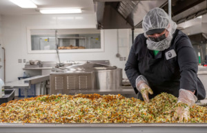 Employees at work in Global Village Foods headquarters in Quechee. The Flexible Capital Fund and Fair Food Fund provided Global Village Foods with $500,000 in financing in July 2022, split evenly between the two entities. Photo by Erica Houskeeper.