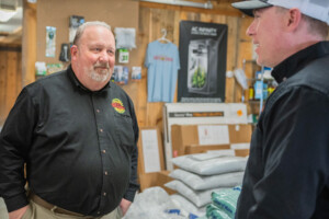 Scott Sparks consults with general manager Jeremy Deschaine. Photo by Erica Houskeeper.