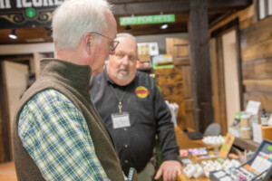 Vermont Sustainable Jobs Fund business coach Victor Morrison, left, consults Scott Sparks on a recent visit to Vermont Hempicurean in West Brattleboro. Photo by Erica Houskeeper.