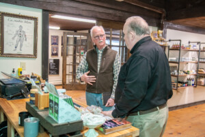 VSJF business coach Victor Morrison, left, consults Scott Sparks on a recent visit to Vermont Hempicurean in West Brattleboro. Photo by Erica Houskeeper.