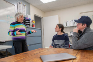 Vermont Sustainable Jobs Fund business coach Jean Kissner talks to Julie Morton, center, and Erika Lynch about Babette’s Table’s business goals. Photo by Erica Houskeeper.