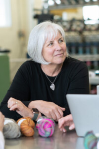 Business coach Carolyn Cooke at Junction Fiber in White River Junction. Photo by Erica Houskeeper.