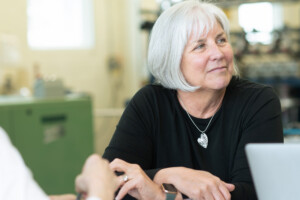 Business coach Carolyn Cooke at Junction Fiber in White River Junction. Photo by Erica Houskeeper.