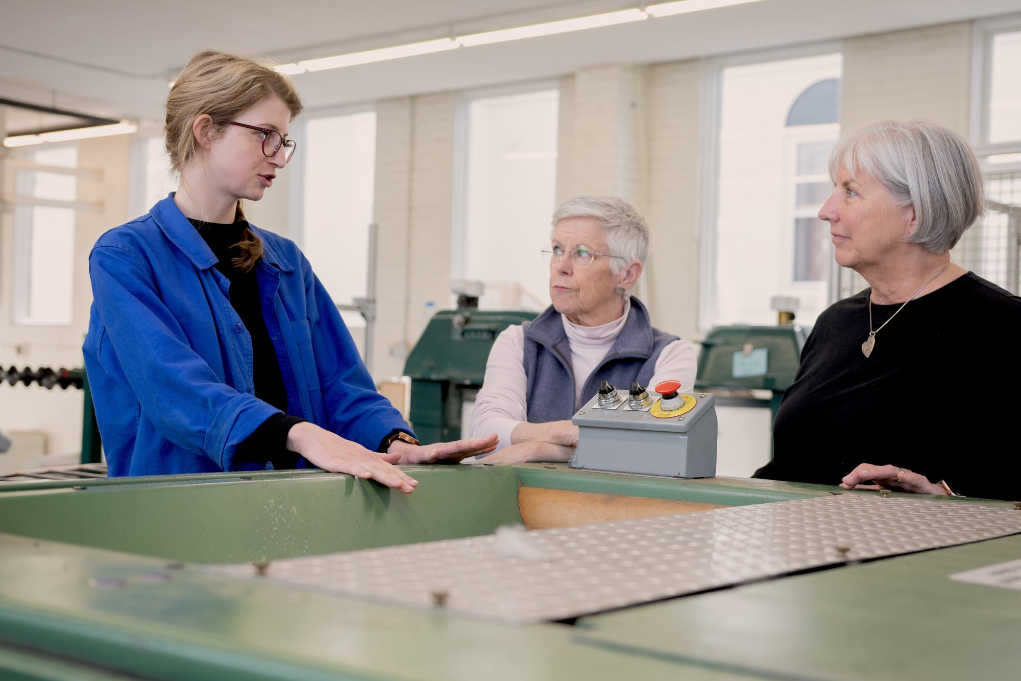 Amanda Kievet and Peggy Allen meet with business coach Carolyn Cooke, right, at Junction Fiber in White River Junction. The two sought out the VSJF Business Coaching program to drill down on the true cost of their product, which was a first step to entering the wholesale market. Photo by Erica Houskeeper.