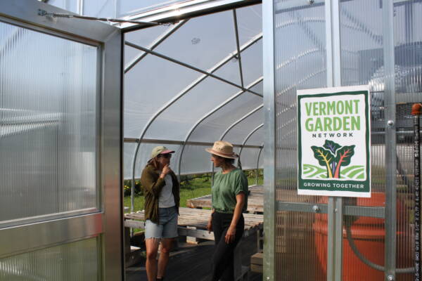 In July, the Farm to Plate Land Access & Land Use Topic Exchange explored community growing spaces at Vermont Garden Network’s greenhouse in Landry Park, Winooski. Photo by Jessica Poulin.
