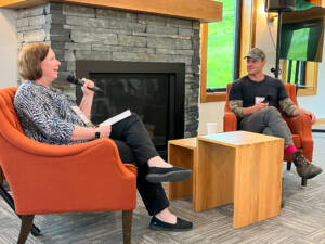Regional partners gathered Thursday, June 19, at Bolton Valley Resort for the 2025 Forest Summit to strengthen Vermont’s forest economy: Program Director Christine McGowan interviewing forester and author Ethan Tapper. Photo by Kelly Nottermann.