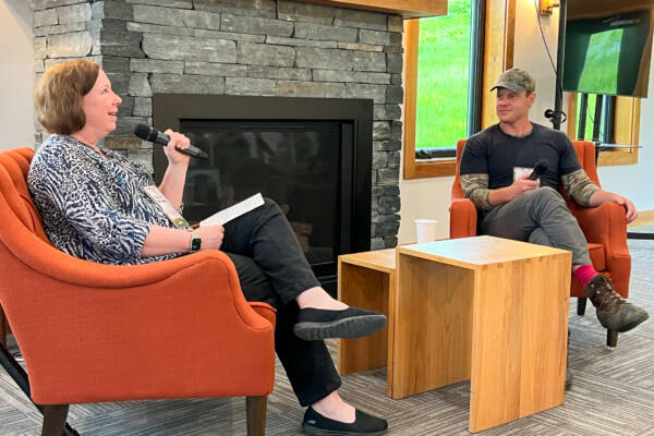 Regional partners gathered Thursday, June 19, at Bolton Valley Resort for the 2025 Forest Summit to strengthen Vermont’s forest economy: Program Director Christine McGowan interviewing forester and author Ethan Tapper. Photo by Kelly Nottermann.