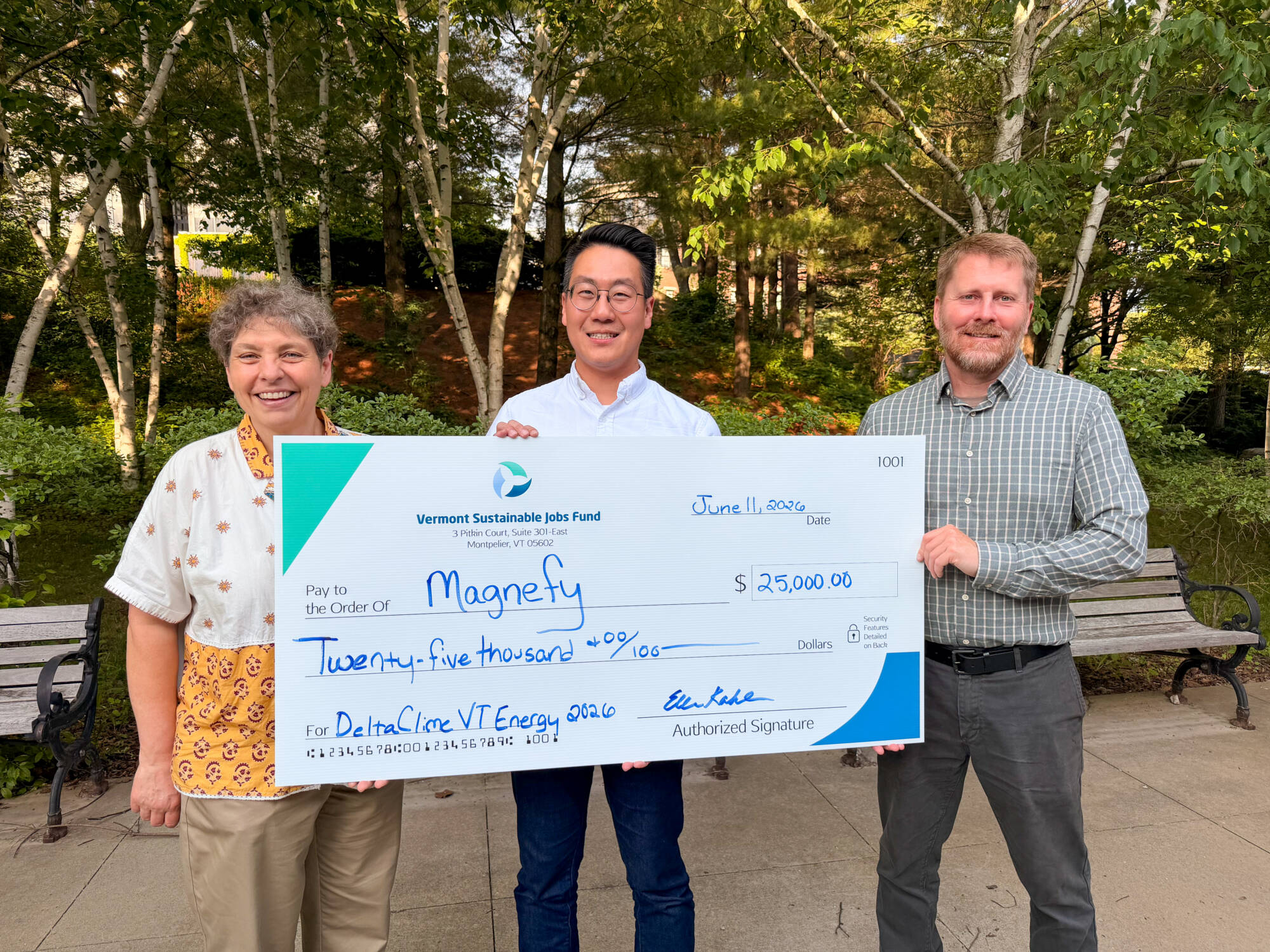 VSJF Executive Director Ellen Kahler (left) and DeltaClimeVT Program Manager Kurt Ericksen (right) present the $25,000 award to Joseph Kao, CEO of Magnefy at the DeltaClimeVT Energy 2026 Celebration. Photo by Kelly Nottermann.